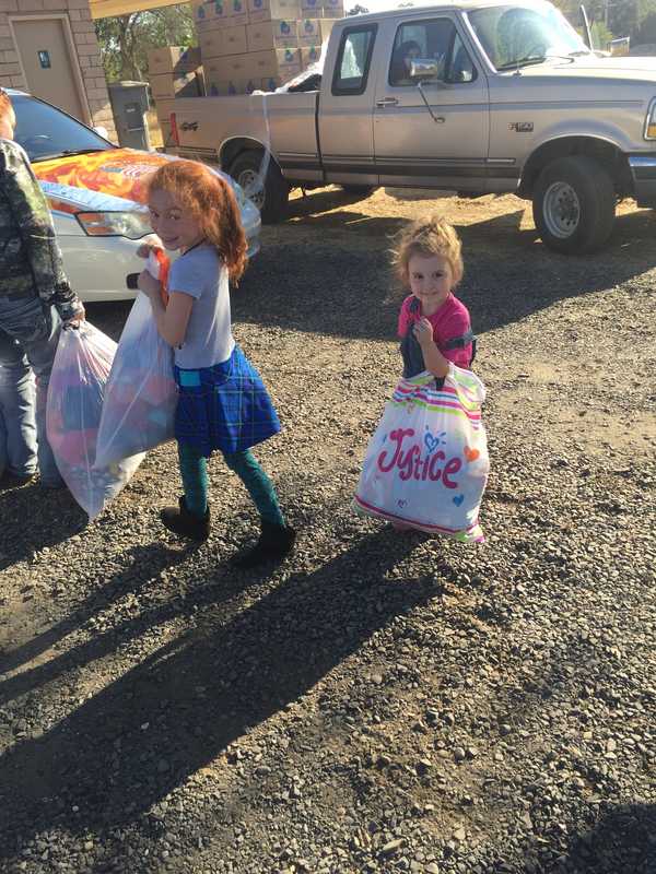 Two young girls helping by donating some of their belongings to Bangor community Two young girls helping by donating some of their belongings to Bangor community